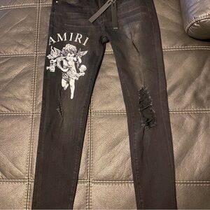 AMIRI Black Skinny Jeans with Distressed Details